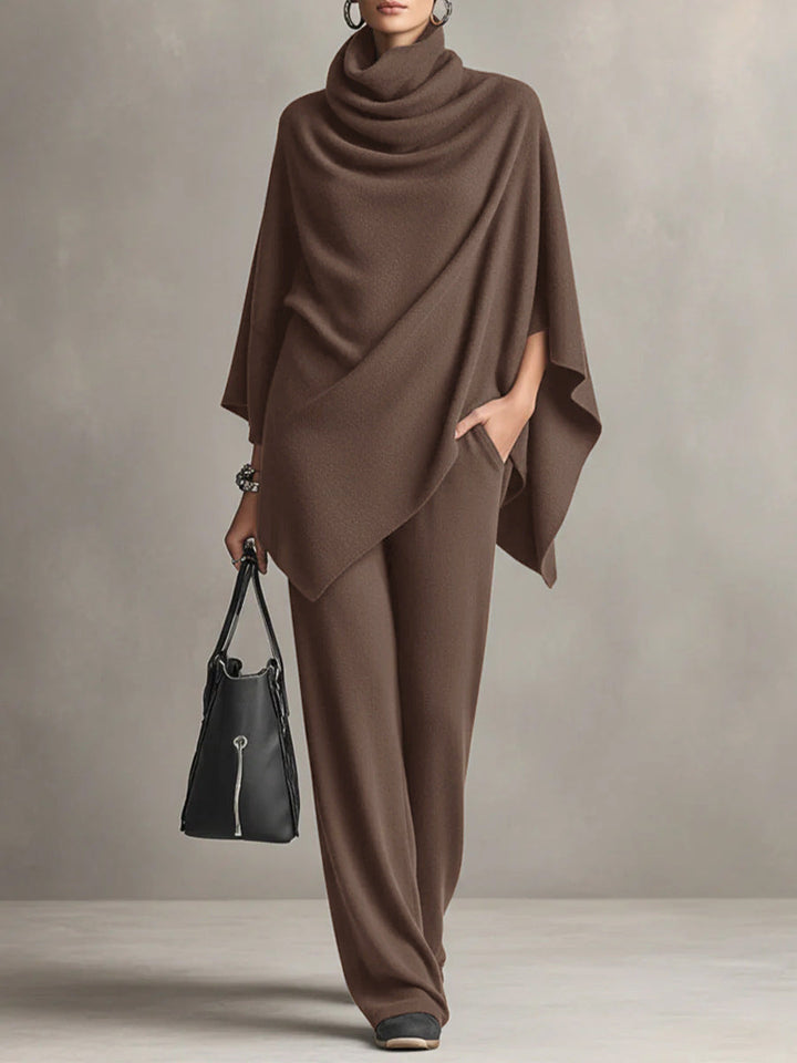 Two-piece set featuring a high-neck cape-style top and wide-leg trousers.